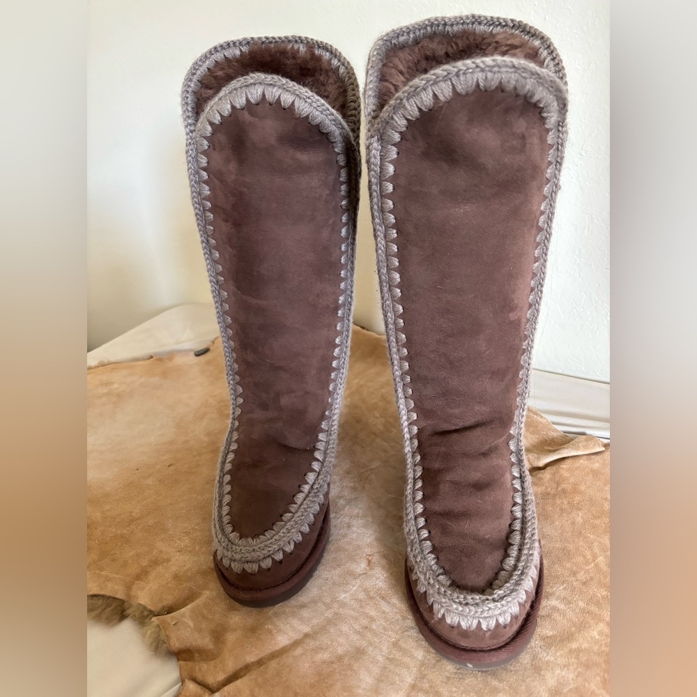 Tall MOU, Eskimo shearling lined wedge winter boot. Added specialty to the back